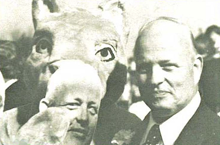 Black and white photograph of Chapter President and University President with Mascot