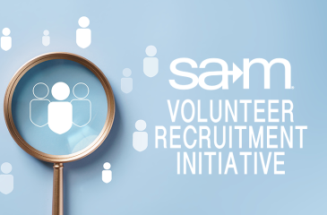 Society for Advancement of Management board committee recruitment graphic with magnifying glass highlighting three person icons on a light blue background, featuring the SAM logo and text 'Volunteer Recruitment Initiative'